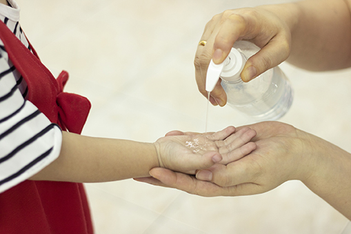 Kid Using Alcogel on Hands