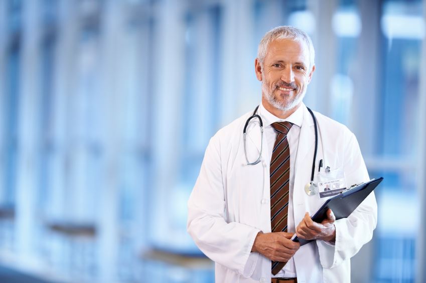 Happy Doctor Holding a Clipboard