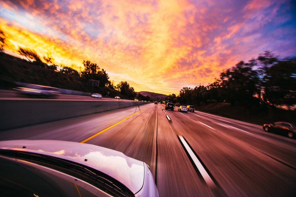 car speeding on the freeway