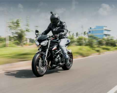 Motorcyclist riding on a road in Connecticut