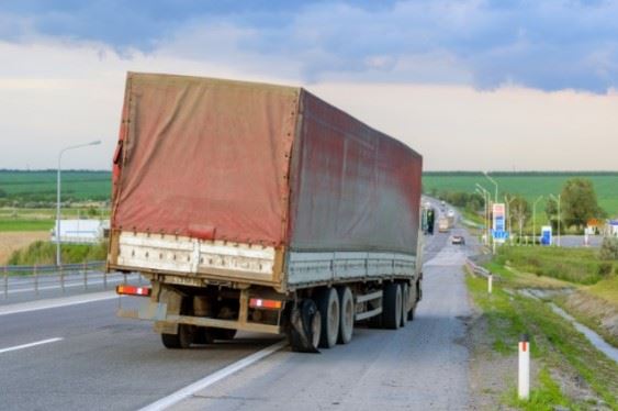 semi truck pulled over on the side of the highway